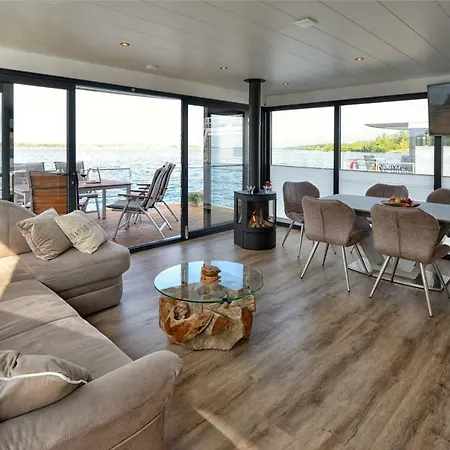Hausboot No. 5 Treibholz Ferienhaus Mucheln