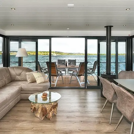 Ferienhaus Hausboot No. 5 Treibholz Mucheln